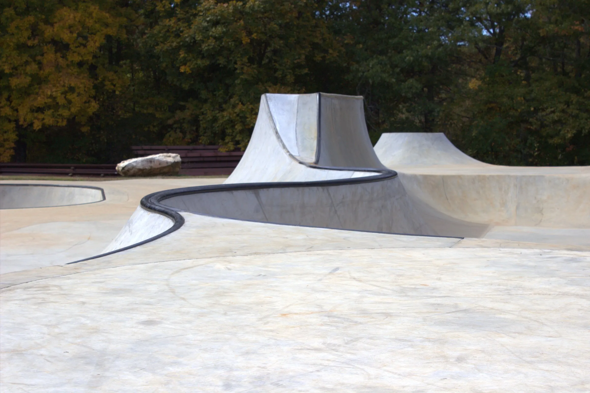 The concrete flow bowl at The Ranch, with a tall extension and the woods behind